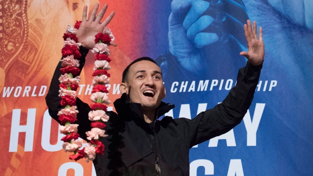 Max Holloway, The Canadian Press Max Holloway