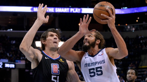 Boban Marjanovic Joakim Noah, The Canadian Press Boban Marjanovic Joakim Noah