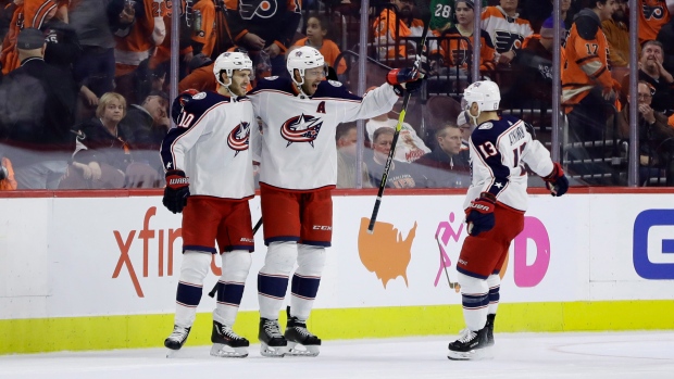 Seth Jones, center, The Canadian Press Seth Jones, center