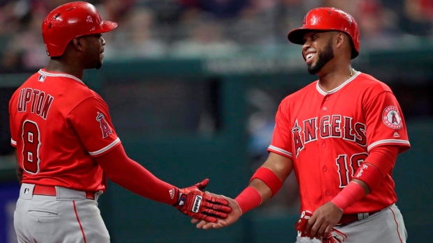 Luis Valbuena Justin Upton , The Canadian Press Luis Valbuena Justin Upton