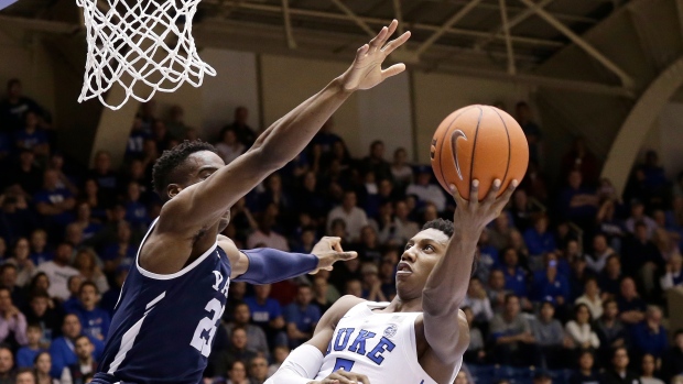 RJ Barrett and Miye Oni , The Canadian Press RJ Barrett and Miye Oni