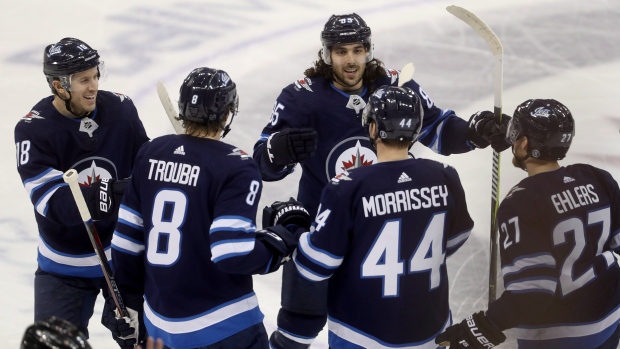 Winnipeg Jets celebrate, The Canadian Press Winnipeg Jets celebrate