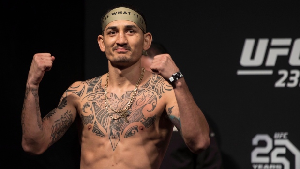 Max Holloway, The Canadian Press Max Holloway