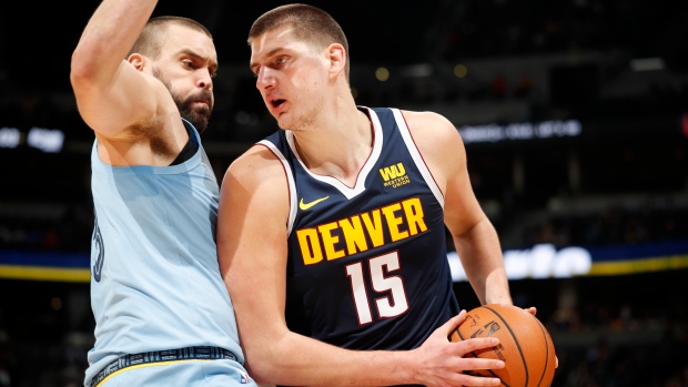 Nikola Jokic and Marc Gasol , The Canadian Press Nikola Jokic and Marc Gasol