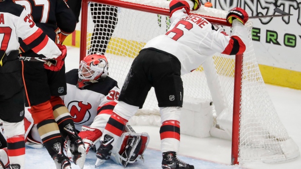 Cory Schneider and Andy Greene