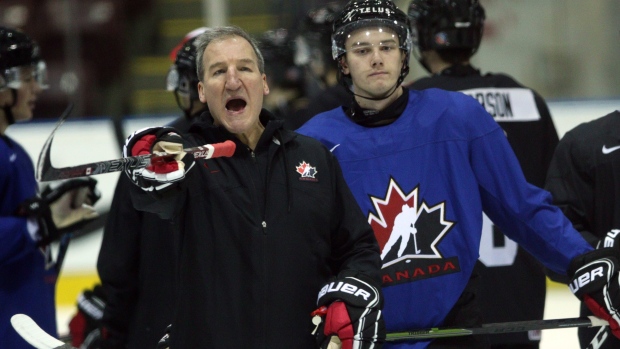 Team Canada head coach Tim Hunter , The Canadian Press Team Canada head coach Tim Hunter
