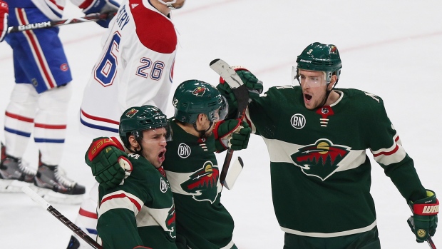 Nino Niederreiter, Zach Parise and Charlie Coyle celebrate vs. Habs