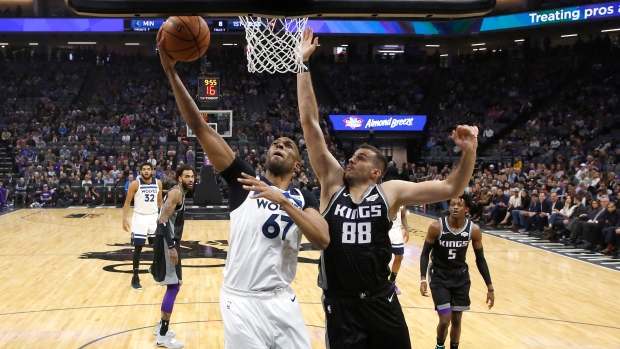 Taj Gibson and Nemanja Bjelica, The Canadian Press Taj Gibson and Nemanja Bjelica