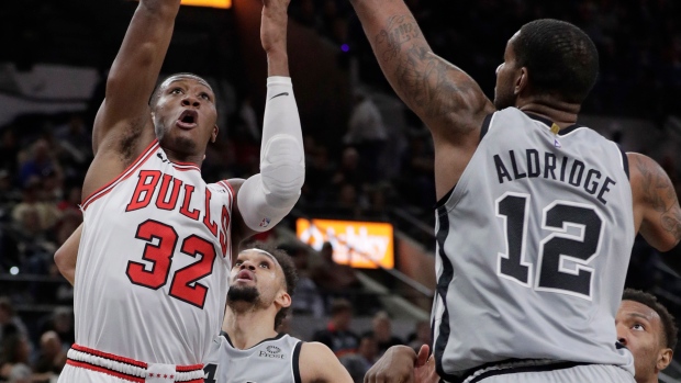 Kris Dunn LaMarcus Aldridge, The Canadian Press Kris Dunn LaMarcus Aldridge