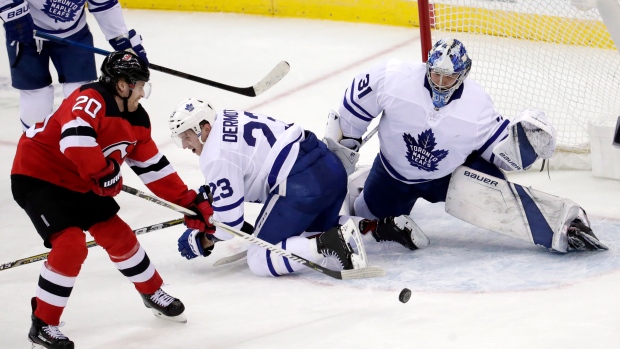 Blake Coleman shoots on Frederik Andersen 