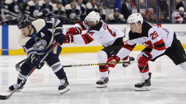 Andy Greene and Cam Atkinson