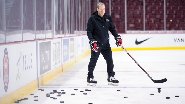 Team Canada head coach Tim Hunter , The Canadian Press Team Canada head coach Tim Hunter