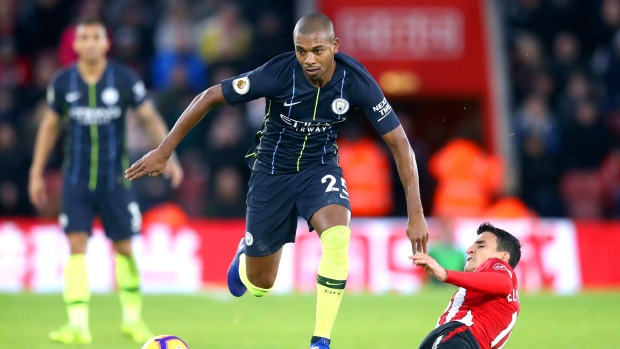 Southampton's Mohamed Elyounoussi, right, and Manchester City's Fernandinho