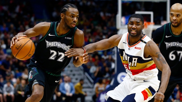 Andrew Wiggins E'Twaun Moore, The Canadian Press Andrew Wiggins E'Twaun Moore