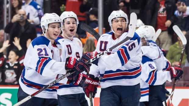 Team USA celebrates, The Canadian Press Team USA celebrates