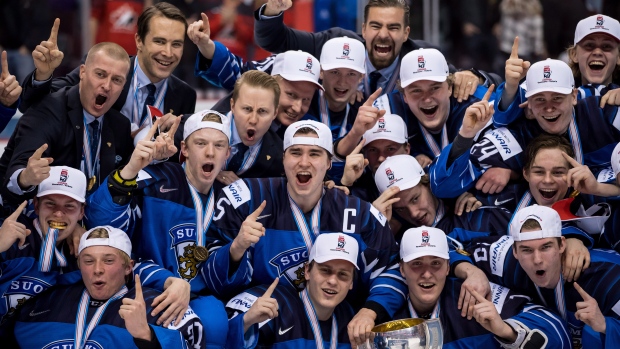 Team Finland celebrates, The Canadian Press Team Finland celebrates