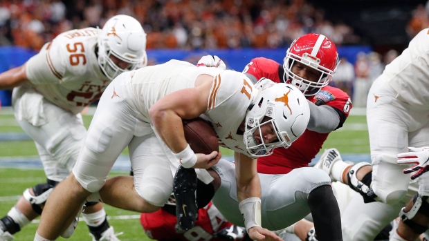 Sam Ehlinger J.R. Reed, The Canadian Press Sam Ehlinger J.R. Reed