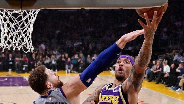 Michael Beasley Blake Griffin, The Canadian Press Michael Beasley Blake Griffin