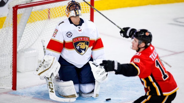 Matthew Tkachuk and Roberto Luongo