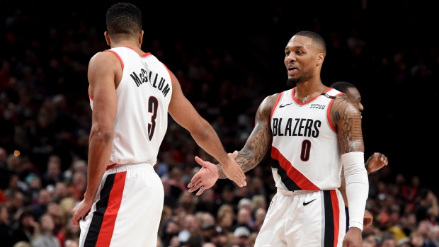 Damian Lillard and CJ McCollum, The Canadian Press Damian Lillard and CJ McCollum