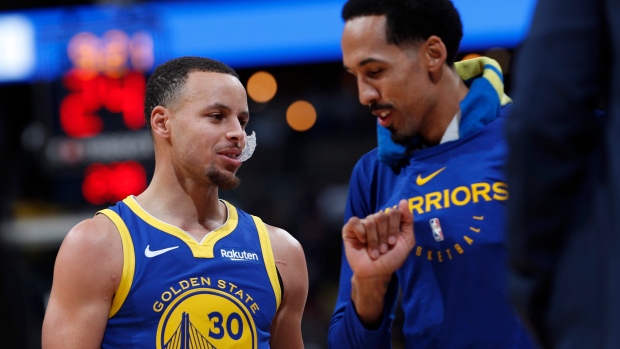 Stephen Curry and Shaun Livingston , The Canadian Press Stephen Curry and Shaun Livingston