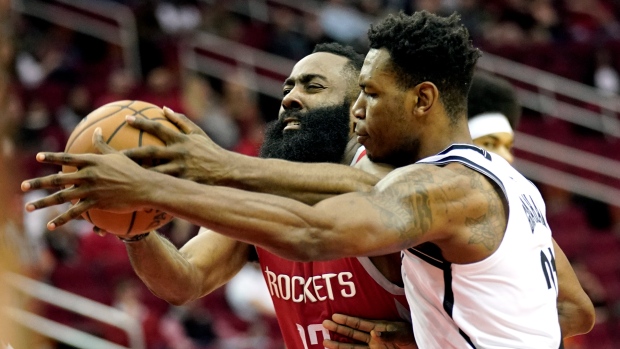 James Harden and Treveon Graham , The Canadian Press James Harden and Treveon Graham