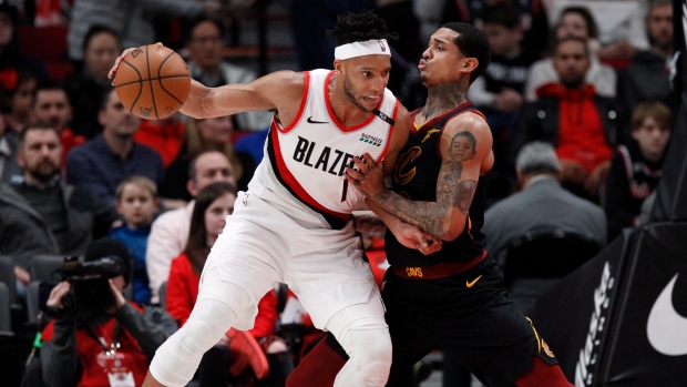 Evan Turner and Jordan Clarkson , The Canadian Press Evan Turner and Jordan Clarkson