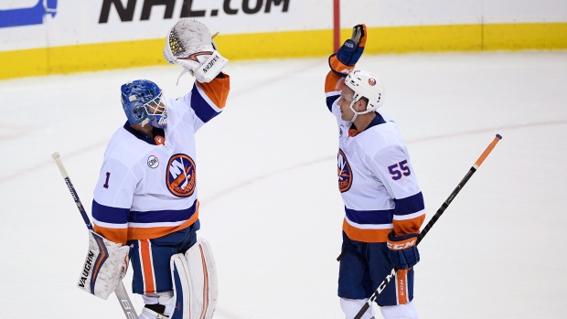 Thomas Greiss and Johnny Boychuk Thomas Greiss and Johnny Boychuk