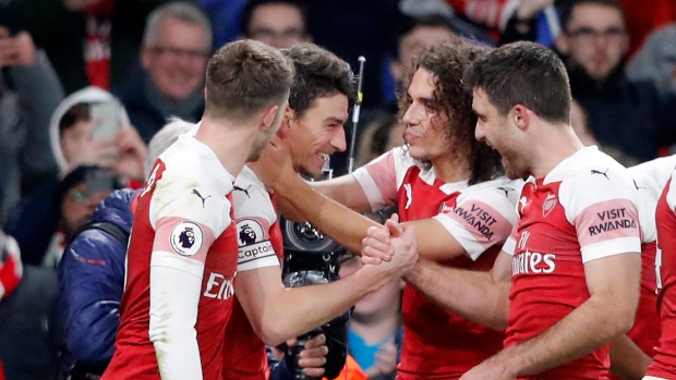 Laurent Koscielny and teammates, The Canadian Press Laurent Koscielny and teammates