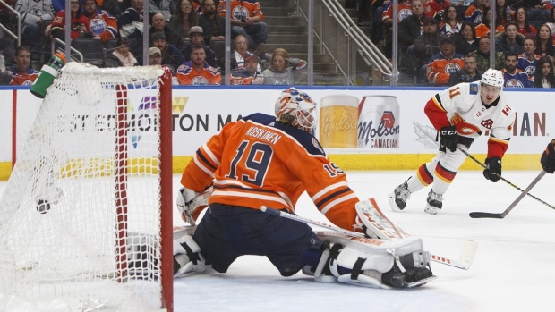 Flames use five different goal scorers to beat Oilers 5-2 Article Image 0, The Canadian Press Flames use five different goal scorers to beat Oilers 5-2 Article Image 0