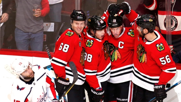 Brett Connolly Jonathan Toews and teammates, The Canadian Press Brett Connolly Jonathan Toews and teammates