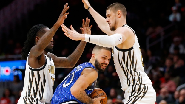 Evan Fournier (10) Taurean Prince (12) Alex Len, The Canadian Press Evan Fournier (10) Taurean Prince (12) Alex Len