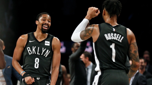 Spencer Dinwiddie (8) and D'Angelo Russell