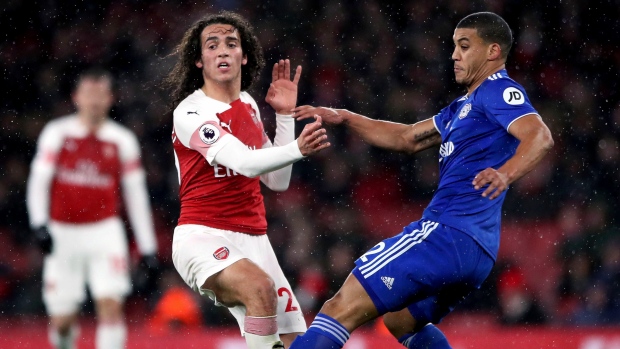 Arsenal's Matteo Guendouzi, left, and Cardiff City's Lee Peltier