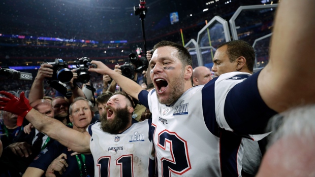 Julian Edelman and Tom Brady celebrate