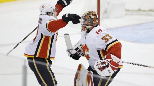Matthew Tkachuk (left), David Rittich (right) , The Canadian Press Matthew Tkachuk (left), David Rittich (right)