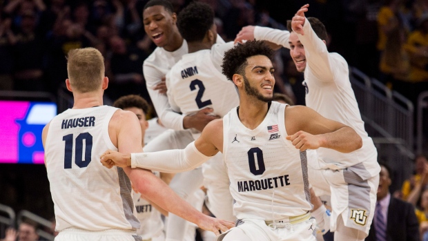 Marquette celebrates, The Canadian Press Marquette celebrates