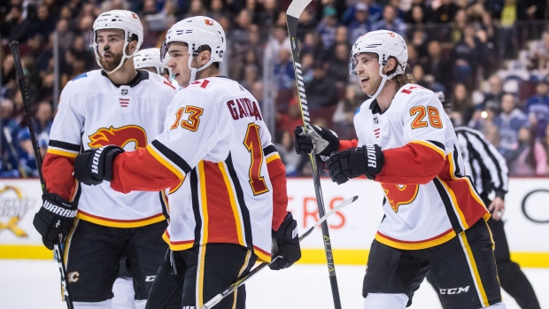 Mark Giordano Johnny Gaudreau Elias Lindholm, The Canadian Press Mark Giordano Johnny Gaudreau Elias Lindholm