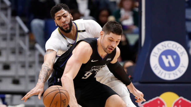 Anthony Davis Nikola Vucevic , The Canadian Press Anthony Davis Nikola Vucevic