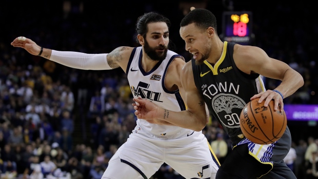 Stephen Curry and Ricky Rubio, The Canadian Press Stephen Curry and Ricky Rubio