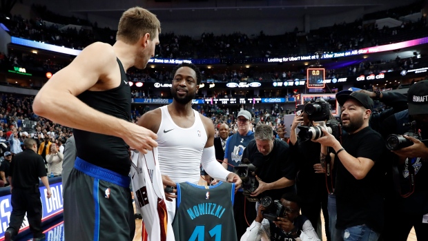 Dirk Nowitzki, Dwyane Wade, The Canadian Press Dirk Nowitzki, Dwyane Wade