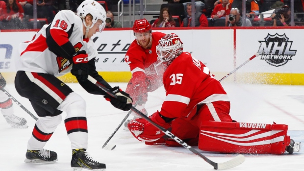 Jimmy Howard stops Ryan Dzingel, The Canadian Press Jimmy Howard stops Ryan Dzingel