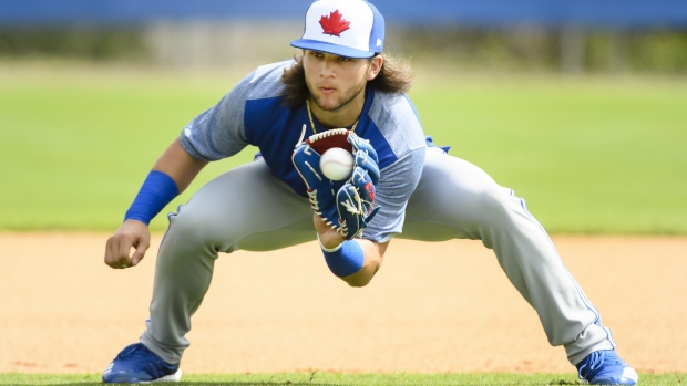 Bo Bichette fields a ground ball on the first day of main camp.