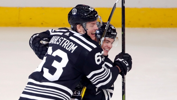 Carl Dahlstrom Alex DeBrincat, The Canadian Press Carl Dahlstrom Alex DeBrincat