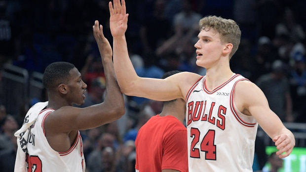 Kris Dunn Lauri Markkanen, The Canadian Press Kris Dunn Lauri Markkanen