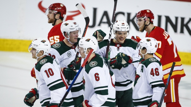 Dubnyk, Wild beat Flames after Jarome Iginla's jersey retirement