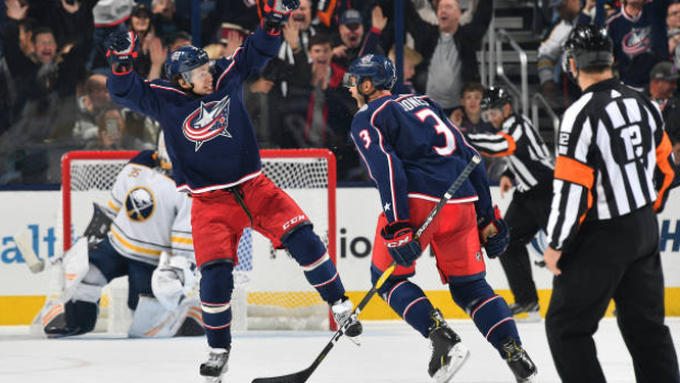 Panarin, Jones celebrate in overtime, Getty Images Panarin, Jones celebrate in overtime