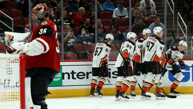 Ducks celebrate behind Kuemper, The Canadian Press Ducks celebrate behind Kuemper