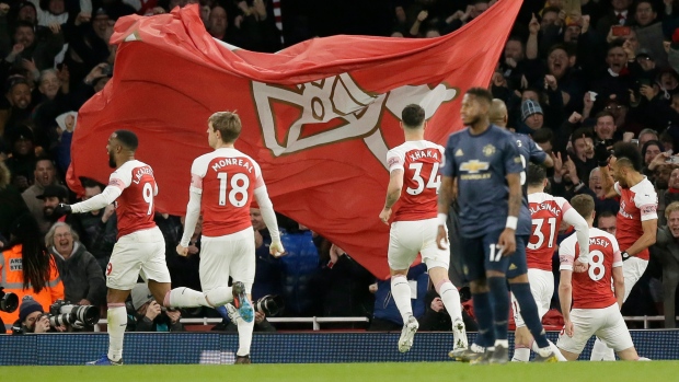 Arsenal celebrates, The Canadian Press Arsenal celebrates