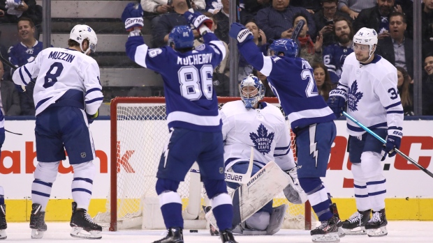 Nikita Kucherov and Brayden Point celebrate a goal against the Leafs Monday., The Canadian Press Nikita Kucherov and Brayden Point celebrate a goal against the Leafs Monday.